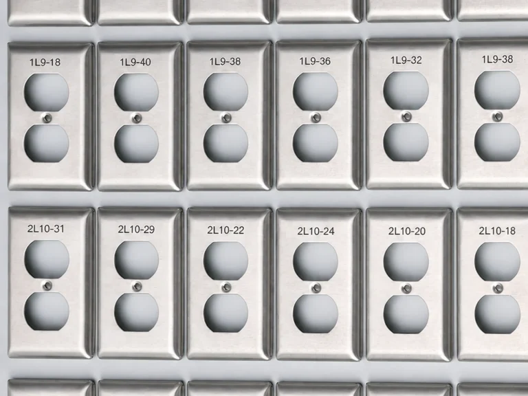 Batch of fiber-laser-engraved stainless steel switch plates