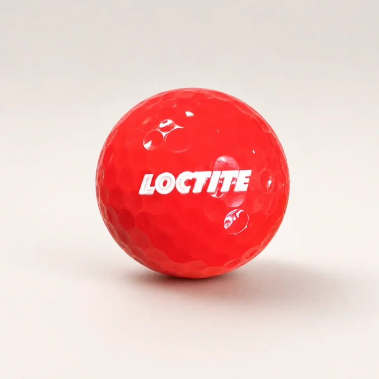 UV-printed Loctite promotional golf ball on a clean studio background