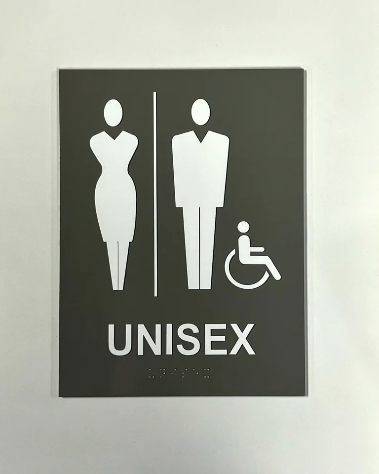 ADA-compliant unisex restroom sign with laser-cut tactile elements and UV-printed clear Braille