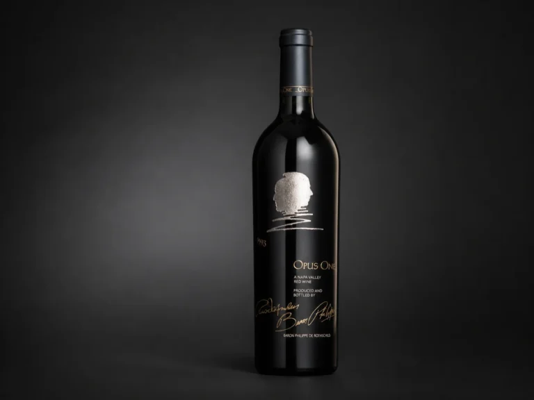 Black Opus One wine bottle with a sandblasted and painted portrait detail