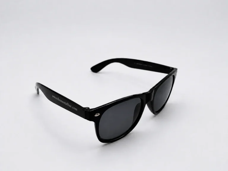 Black promotional sunglasses with a pad-printed website address on the temple