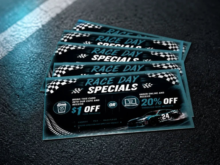 Custom full-color race-day promotional cards arranged on a track-inspired studio background