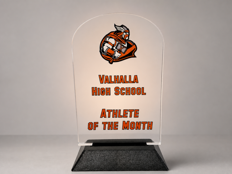 Custom UV-printed acrylic athlete award displayed on a simple neutral studio background